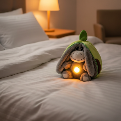 Peluche luminoso en cama acogedora